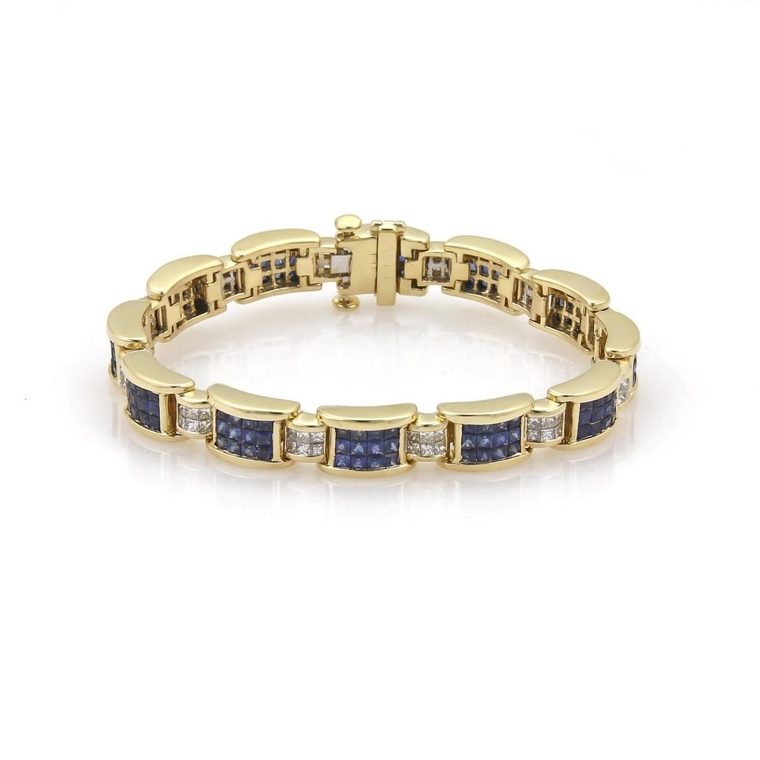 Elegant 18k Yellow Gold Diamond Sapphire Bracelet Princess Cut: Elegant 18k Yellow Gold Diamond Sapphire Bracelet Princess Cut This stunning bracelet showcases an elegant design crafted from 18k yellow gold with a high polished finish. It features 23 curved bar li