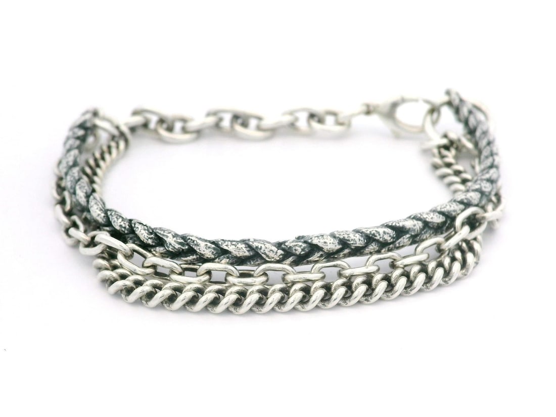 Sterling Silver Multi Chain Dangle Cuff Bracelet 7 Inch: Sterling Silver Multi Chain Dangle Cuff Bracelet 7 Inch This unique bracelet showcases a stack look with multiple chain styles, crafted from high-quality .925 sterling silver. The open cuff design fea