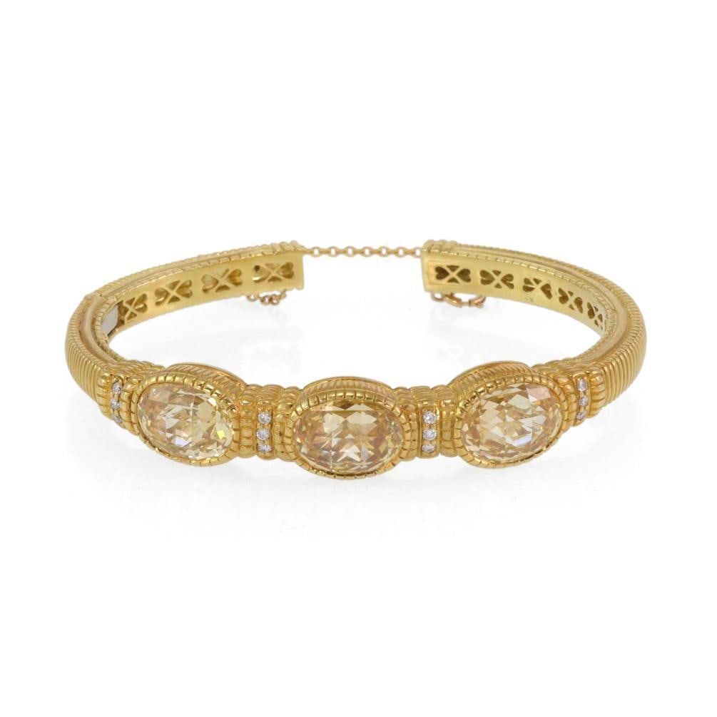 Judith Ripka 18k Yellow Gold 3 Stone Cuff Bracelet with Diamonds and Canary Crystals: Judith Ripka 18k Yellow Gold 3 Stone Cuff Bracelet with Diamonds and Canary Crystals Elevate your style with this exquisite cuff bracelet by Judith Ripka. Crafted from luxurious 18k yellow gold, this