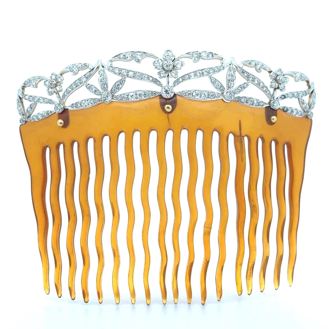 Antique Edwardian Tiffany & Co. 5ctw Diamond Comb in Platinum and Gold: Antique Edwardian Tiffany & Co. 5ctw Diamond Comb in Platinum and Gold This exquisite Antique Edwardian brooch from Tiffany & Co. features a stunning combination of solid platinum and yellow gold, ado