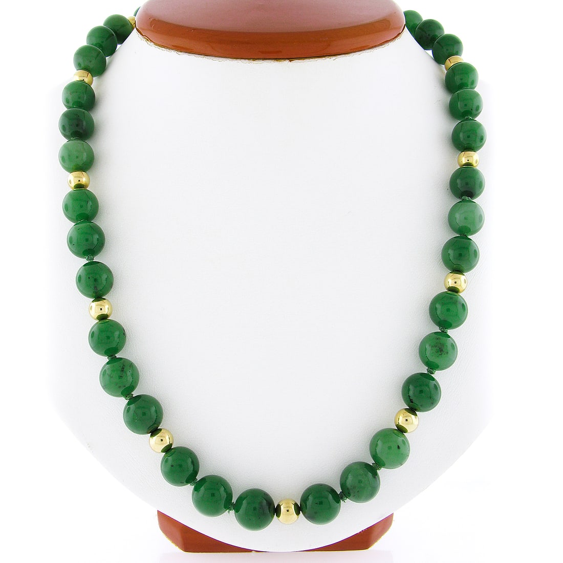 Vintage 29 Inch Nephrite Jade Bead Necklace with 14k Gold Accents: Vintage 29 Inch Nephrite Jade Bead Necklace with 14k Gold Accents This stunning vintage necklace features a 29-inch strand of 56 round nephrite jade beads, artfully complemented by polished 14k yellow
