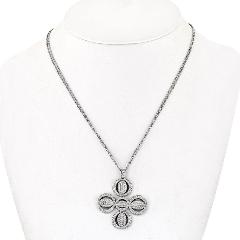 Chopard 18K White Gold Diamond Pendant 5.25 Cts 24 Inch Chain: Chopard 18K White Gold Diamond Pendant 5.25 Cts 24 Inch Chain This stunning Chopard pendant features exquisite craftsmanship in 18K white gold, weighing 26.2 grams. The pendant is adorned with