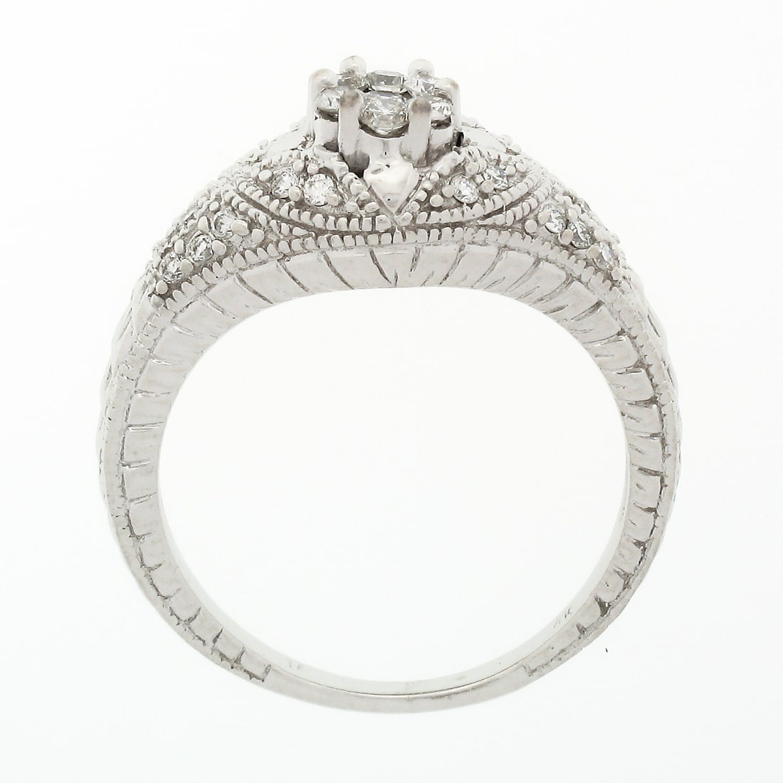 14k White Gold Cluster Diamond Promise Ring with Milgrain Detail: 14k White Gold Cluster Diamond Promise Ring with Milgrain Detail This exquisite estate promise ring is crafted from solid 14k white gold and showcases a stunning cluster of round brilliant diamonds.