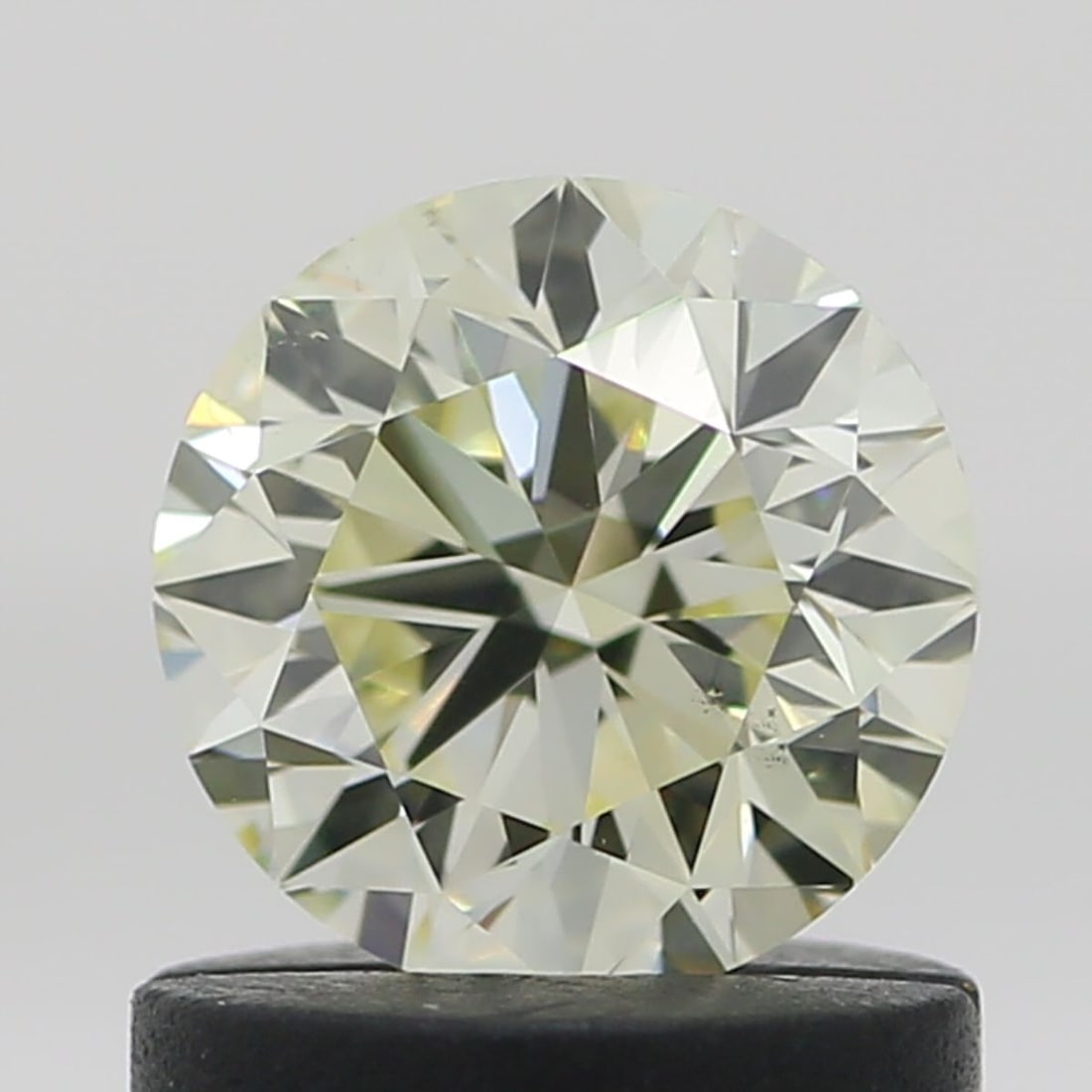 Loose Diamond - ROUND 0.8ct N-O VS2: Loose Diamond - ROUND 0.8ct N-O VS2 Source: Natural Shape: ROUND Carats: 0.8 Color: N-O Certification: HRD Video: