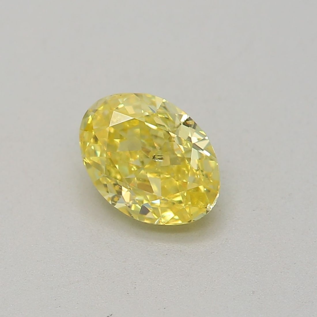 Loose Diamond - OVAL 0.53ct Fancy Intense Yellow SI2: Loose Diamond - OVAL 0.53ct Fancy Intense Yellow SI2 Source: Natural Shape: OVAL Carats: 0.53 Color: Fancy Intense Yellow Certification: GIA Video:
