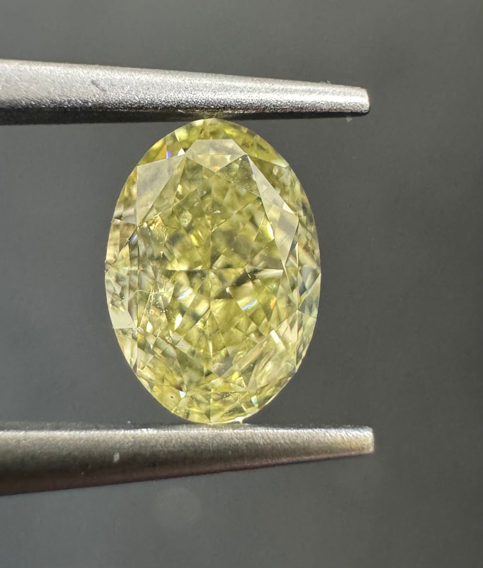 Loose Diamond - OVAL 0.72ct Fancy Light Yellow SI1: Loose Diamond - OVAL 0.72ct Fancy Light Yellow SI1 Source: Natural Shape: OVAL Carats: 0.72 Color: Fancy Light Yellow Certification: GIA PLEASE NOTE: Framed, Large, or heavy items do not have shipping