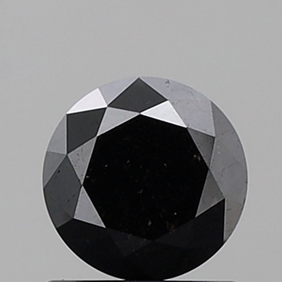 Loose Diamond - ROUND 1.16ct Fancy Black VVS2: Loose Diamond - ROUND 1.16ct Fancy Black VVS2 Source: Natural Shape: ROUND Carats: 1.16 Color: Fancy Black Certification: NONE Video: