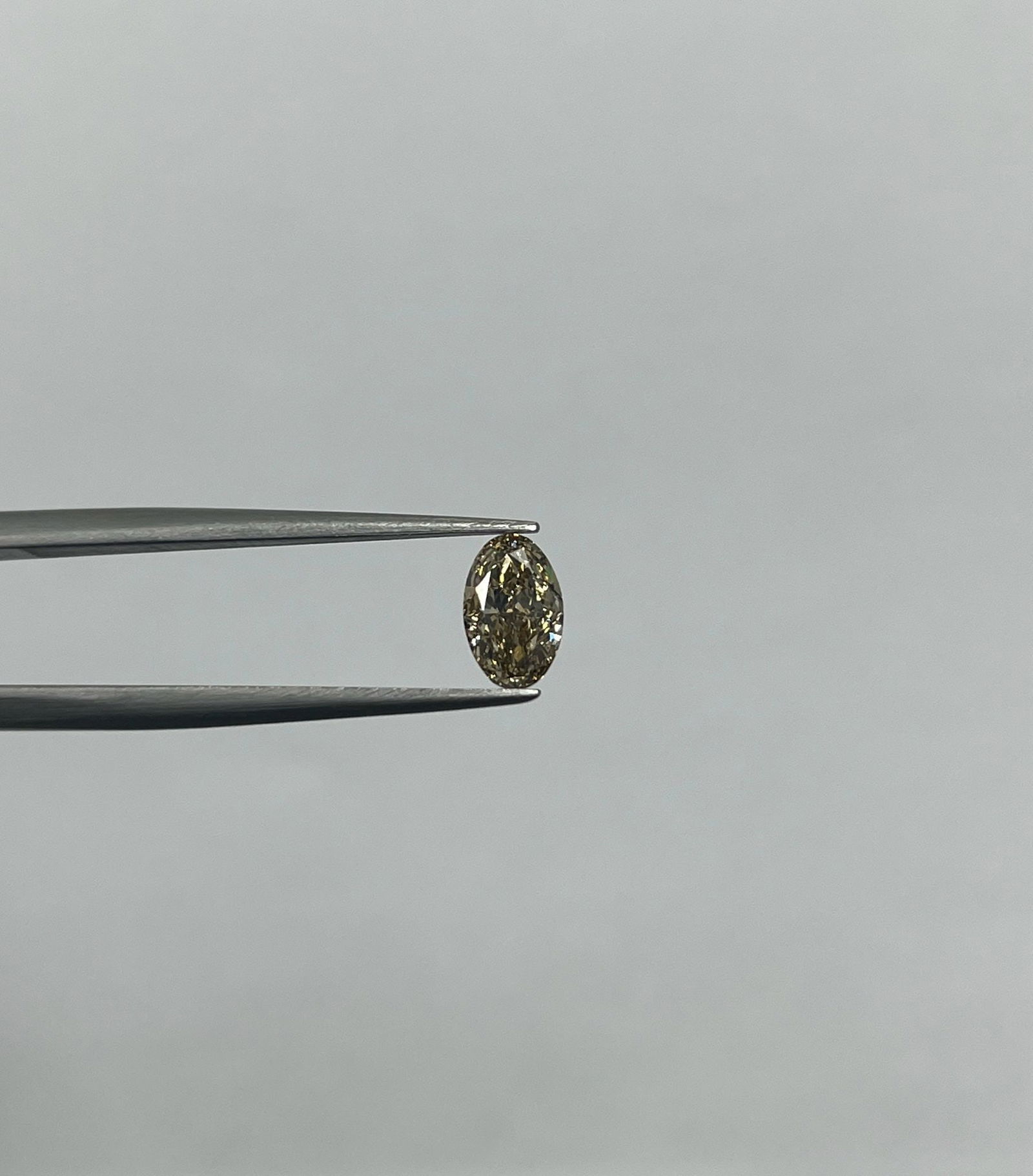 Loose Diamond - OVAL 1.02ct Fancy Brown Yellow VS1: Loose Diamond - OVAL 1.02ct Fancy Brown Yellow VS1 Source: Natural Shape: OVAL Carats: 1.02 Color: Fancy Brown Yellow Certification: GIA Video: