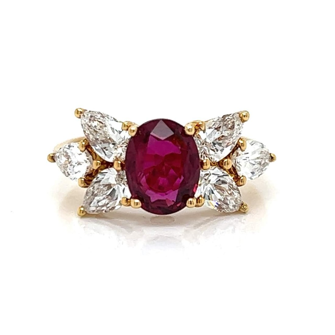 18K Yellow Gold Ruby Diamond Ring 1.50 Ct Center 2.10 Ct Diamonds: 18K Yellow Gold Ruby Diamond Ring 1.50 Ct Center 2.10 Ct Diamonds This stunning 18K Yellow Gold Ruby & Diamond Ring features a central ruby weighing approximately 1.50 Ct, beautifully complemented by