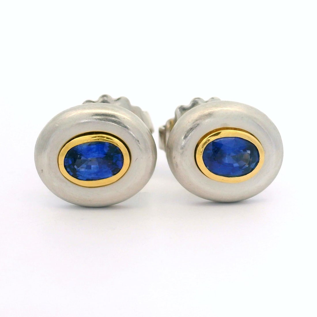Platinum Yellow Gold 1.20ctw Bezel Set Blue Sapphire Stud Earrings: Platinum Yellow Gold 1.20ctw Bezel Set Blue Sapphire Stud Earrings Elevate your style with these exquisite stud earrings featuring natural genuine sapphires. Crafted with precision, each earring boast