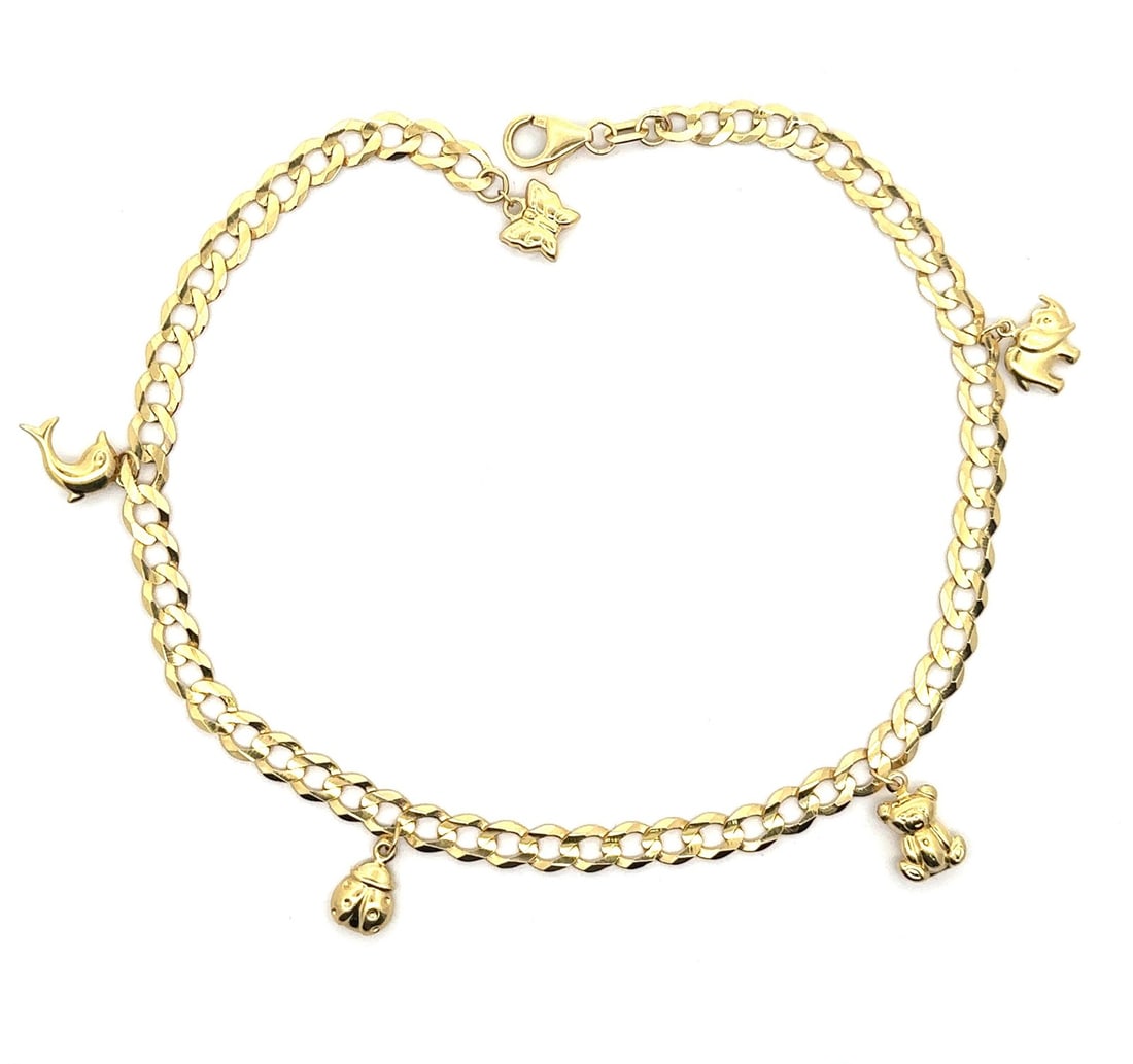 14k Yellow Gold 11 Inch Curb Chain Animal Charms Anklet: 14k Yellow Gold 11 Inch Curb Chain Animal Charms Anklet This exquisite anklet features a stunning 14k yellow gold curb chain adorned with delightful animal charms. Each charm, crafted in a hollow desi