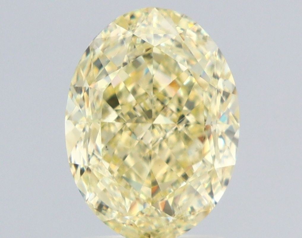 Loose Diamond - OVAL 2.51ct Fancy Light Yellow VS2: Loose Diamond - OVAL 2.51ct Fancy Light Yellow VS2 Source: Natural Shape: OVAL Carats: 2.51 Color: Fancy Light Yellow Certification: GIA Video: