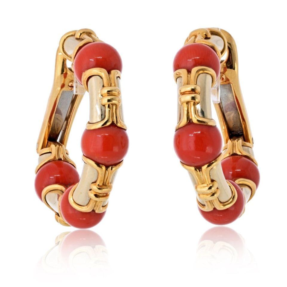 Bvlgari Vintage 18K Yellow Gold Coral Hoop Earrings 1989: Bvlgari Vintage 18K Yellow Gold Coral Hoop Earrings 1989 These vintage Bvlgari earrings from circa 1989 showcase a chic expression of the brand's bold yet timeless aesthetic. Crafted in 18K yellow gol