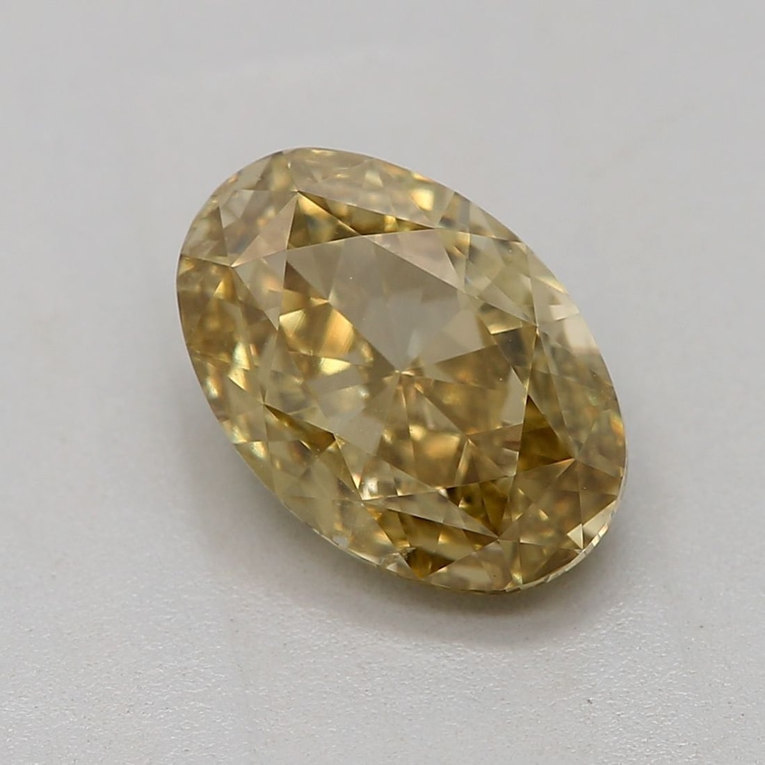 Loose Diamond - OVAL 1.06ct Fancy Deep Brownish Greenish Yellow SI1: Loose Diamond - OVAL 1.06ct Fancy Deep Brownish Greenish Yellow SI1 Source: Natural Shape: OVAL Carats: 1.06 Color: Fancy Deep Brownish Greenish Yellow Certification: GIA Video: