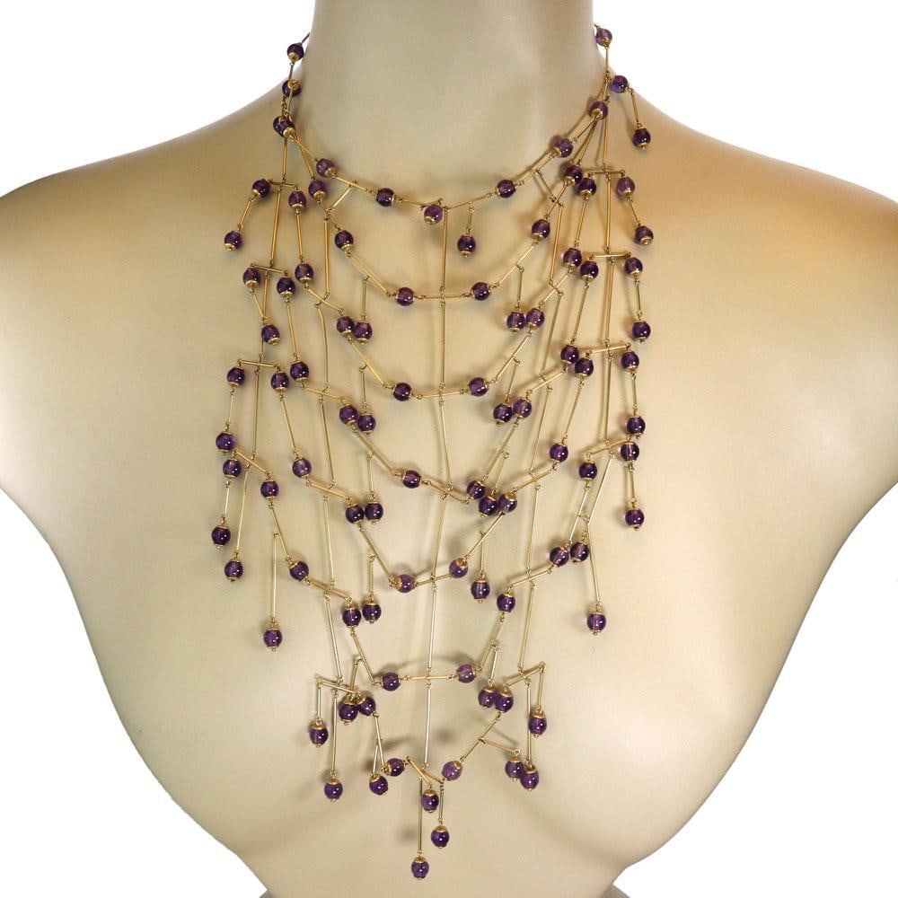 Gucci Amethyst 18k Yellow Gold Festoon Necklace Made in Italy: Gucci Amethyst 18k Yellow Gold Festoon Necklace Made in Italy This exquisite necklace from Gucci showcases a stunning design crafted from high-quality 18k yellow gold with a smooth polished finish. Th