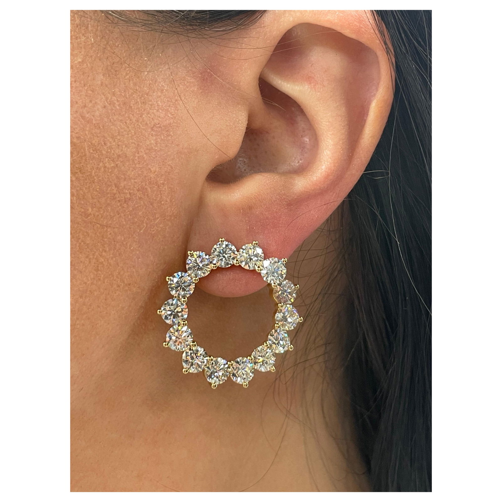 Swirl Hoop Earrings in 18k Yellow Gold with 13.26 Carat Round Diamonds: Swirl Hoop Earrings in 18k Yellow Gold with 13.26 Carat Round Diamonds These contemporary swirl hoop earrings are expertly crafted in 18 karat yellow gold and feature 28 brilliant round-cut diamonds w