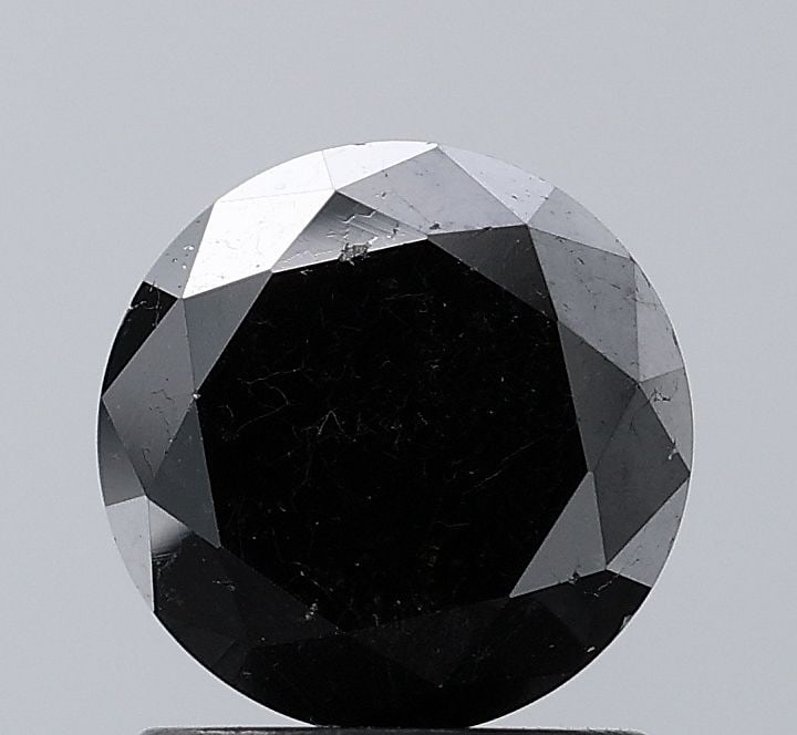 Loose Diamond - ROUND 1.75ct Black VS1: Loose Diamond - ROUND 1.75ct Black VS1 Source: Natural Shape: ROUND Carats: 1.75 Color: Black Certification: NONE Video: Video Link PLEASE NOTE: Framed, Large, or heavy items do not have shipping