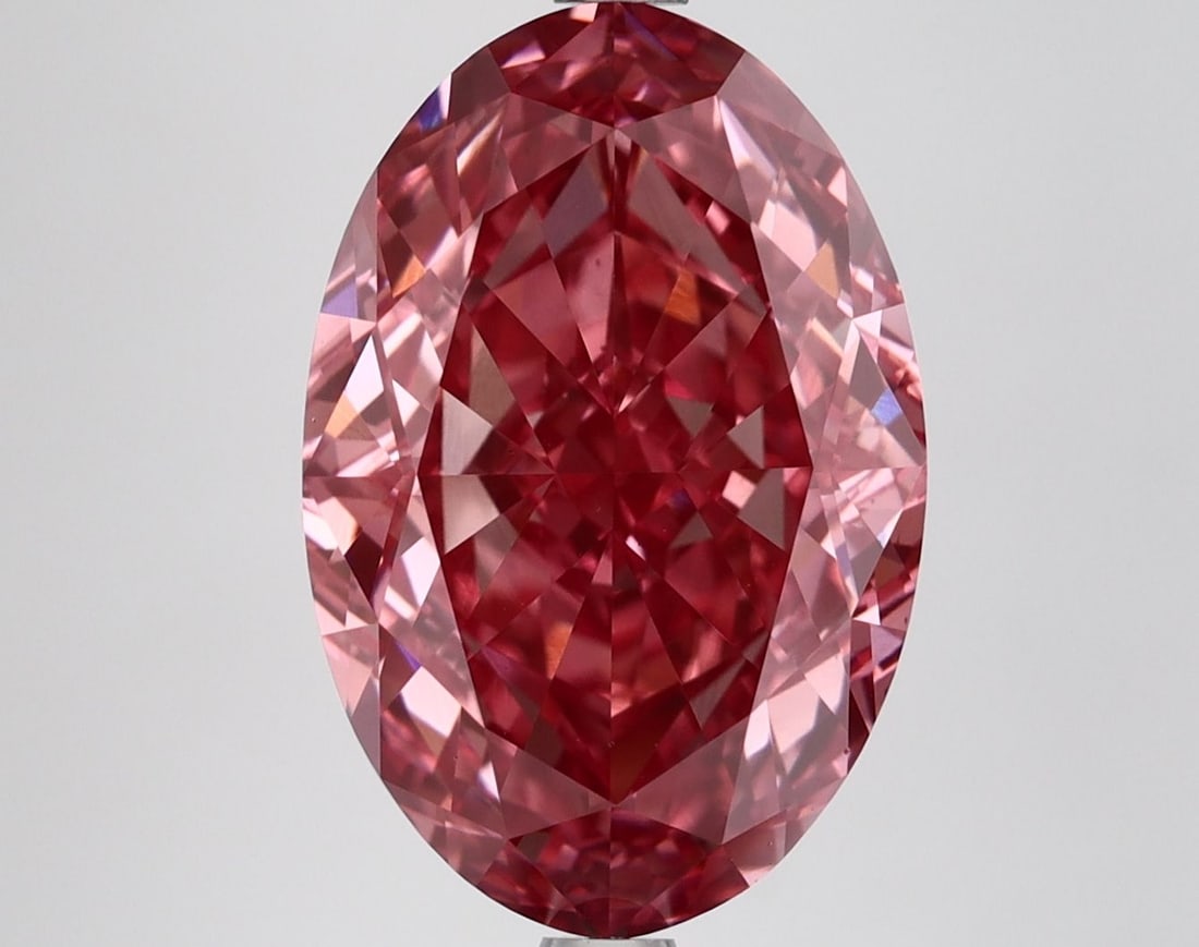 Loose Diamond - OVAL 6.59ct Fancy Vivid Pink VS1: Loose Diamond - OVAL 6.59ct Fancy Vivid Pink VS1 Source: This is a real non-mined Diamond that has been grown in a lab Shape: OVAL Carats: 6.59 Color: Fancy Vivid Pink Certification: IGI Video: