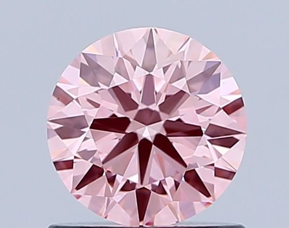 Loose Diamond - ROUND 0.81ct Fancy Intense Pink VVS1: Loose Diamond - ROUND 0.81ct Fancy Intense Pink VVS1 Source: This is a real non-mined Diamond that has been grown in a lab Shape: ROUND Carats: 0.81 Color: Fancy Intense Pink Certification: IGI Video: