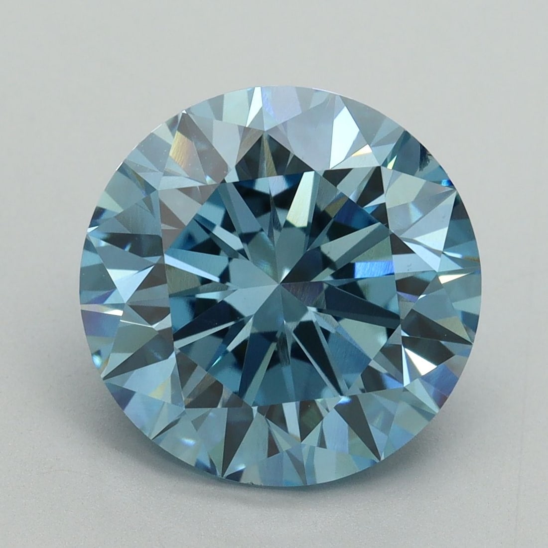 Loose Diamond - ROUND 6.04ct Fancy Vivid Blue VS2: Loose Diamond - ROUND 6.04ct Fancy Vivid Blue VS2 Source: This is a real non-mined Diamond that has been grown in a lab Shape: ROUND Carats: 6.04 Color: Fancy Vivid Blue Certification: IGI Video: