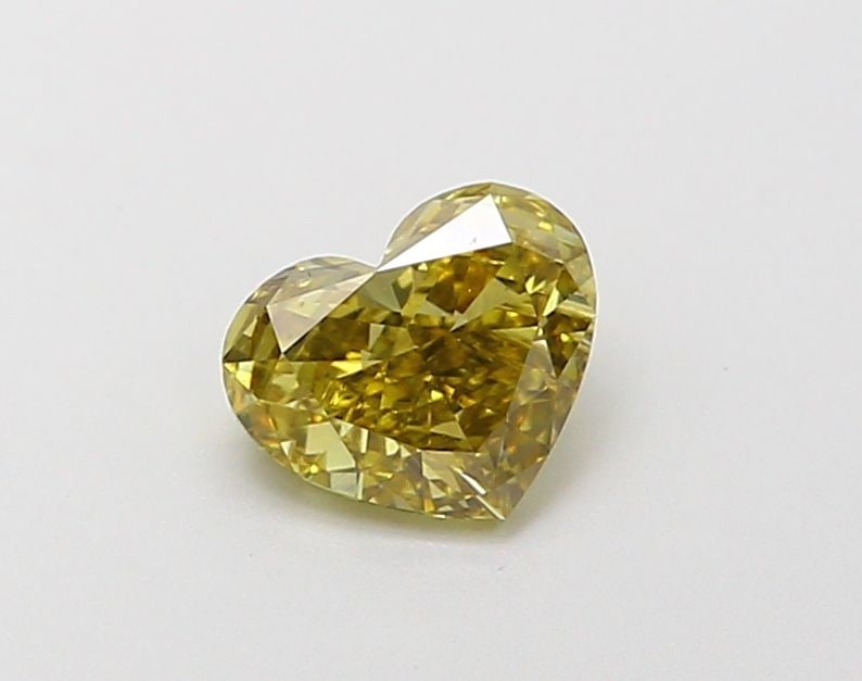 Loose Diamond - HEART 0.6ct Fancy Vivid Yellow VS1: Loose Diamond - HEART 0.6ct Fancy Vivid Yellow VS1 Source: This is a real non-mined Diamond that has been grown in a lab Shape: HEART Carats: 0.6 Color: Fancy Vivid Yellow Certification: NONE Video: