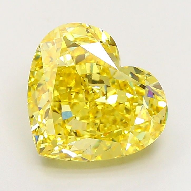 Loose Diamond - HEART 9.04ct Fancy Vivid Yellow VS2: Loose Diamond - HEART 9.04ct Fancy Vivid Yellow VS2 Source: This is a real non-mined Diamond that has been grown in a lab Shape: HEART Carats: 9.04 Color: Fancy Vivid Yellow Certification: IGI Video:
