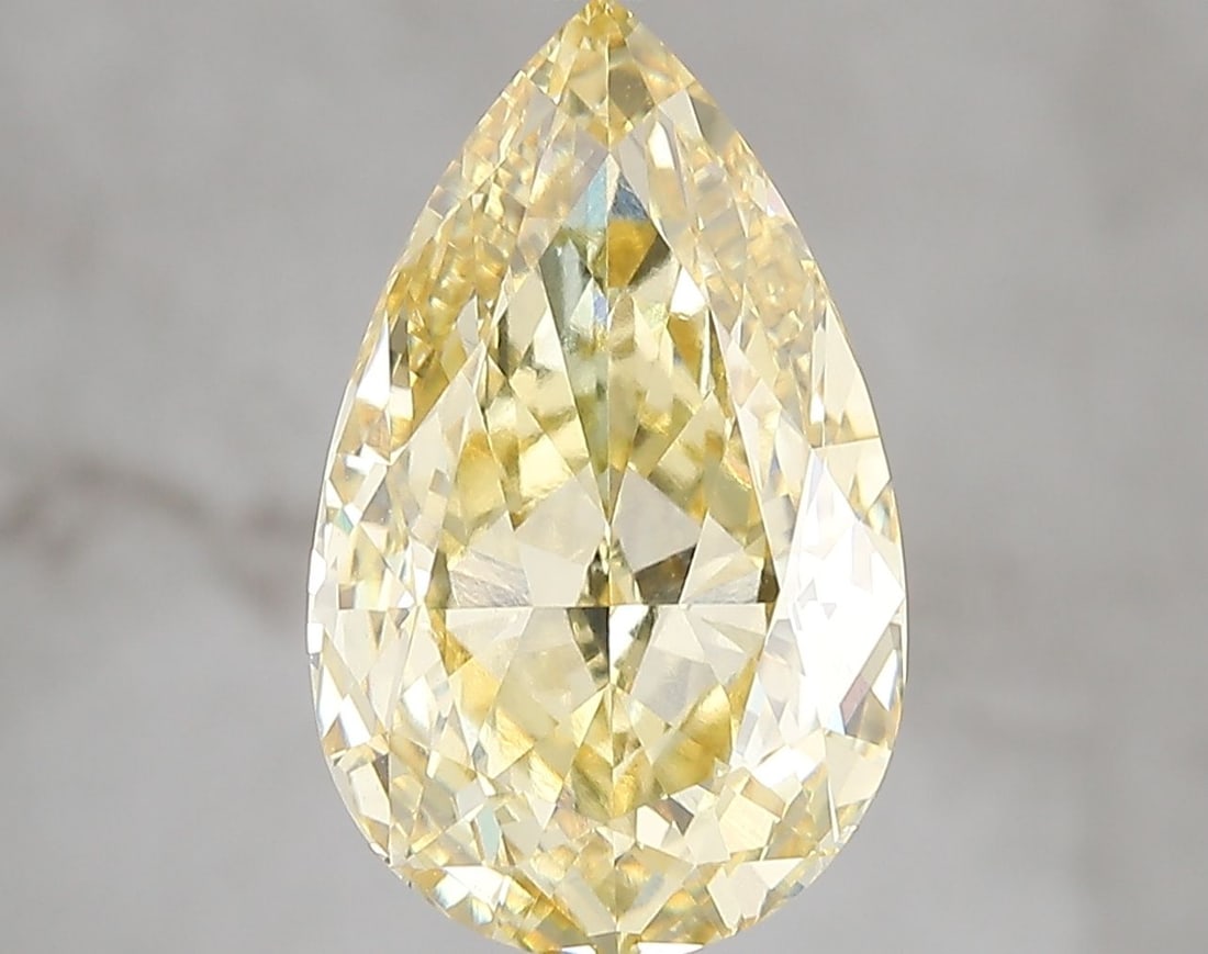Loose Diamond - PEAR 5.04ct Fancy Vivid Yellow VVS2: Loose Diamond - PEAR 5.04ct Fancy Vivid Yellow VVS2 Source: This is a real non-mined Diamond that has been grown in a lab Shape: PEAR Carats: 5.04 Color: Fancy Vivid Yellow Certification: IGI Video: