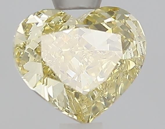 Loose Diamond - HEART 1.04ct Fancy Yellow VVS2: Loose Diamond - HEART 1.04ct Fancy Yellow VVS2 Source: This is a real non-mined Diamond that has been grown in a lab Shape: HEART Carats: 1.04 Color: Fancy Yellow Certification: IGI Video: