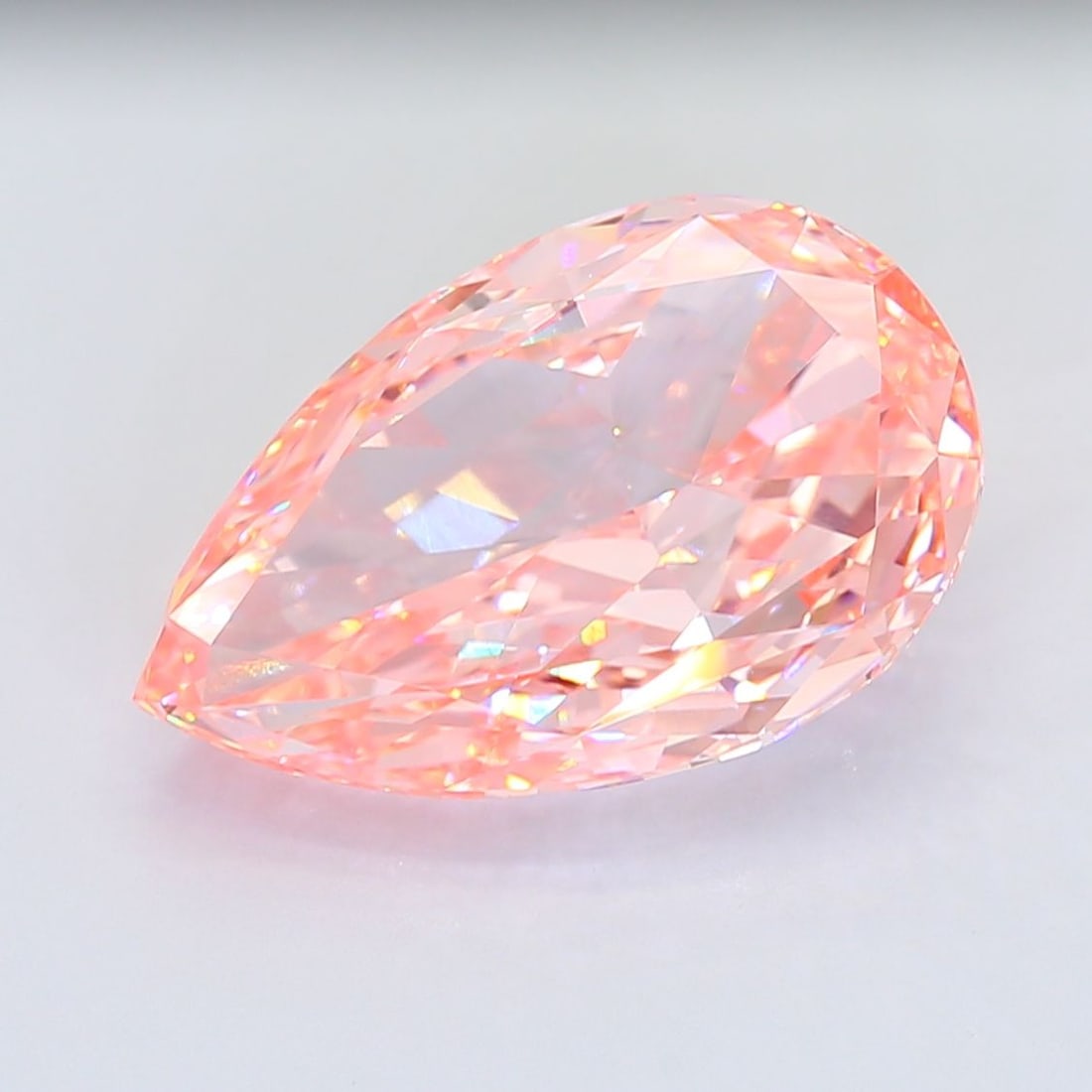 Loose Diamond - PEAR 15.1ct Fancy Vivid Pink VS1: Loose Diamond - PEAR 15.1ct Fancy Vivid Pink VS1 Source: This is a real non-mined Diamond that has been grown in a lab Shape: PEAR Carats: 15.1 Color: Fancy Vivid Pink Certification: IGI Video: