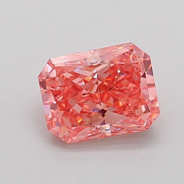 Loose Diamond - RADIANT 0.98ct Fancy Vivid Pink VS2: Loose Diamond - RADIANT 0.98ct Fancy Vivid Pink VS2 Source: This is a real non-mined Diamond that has been grown in a lab Shape: RADIANT Carats: 0.98 Color: Fancy Vivid Pink Certification: IGI Video: