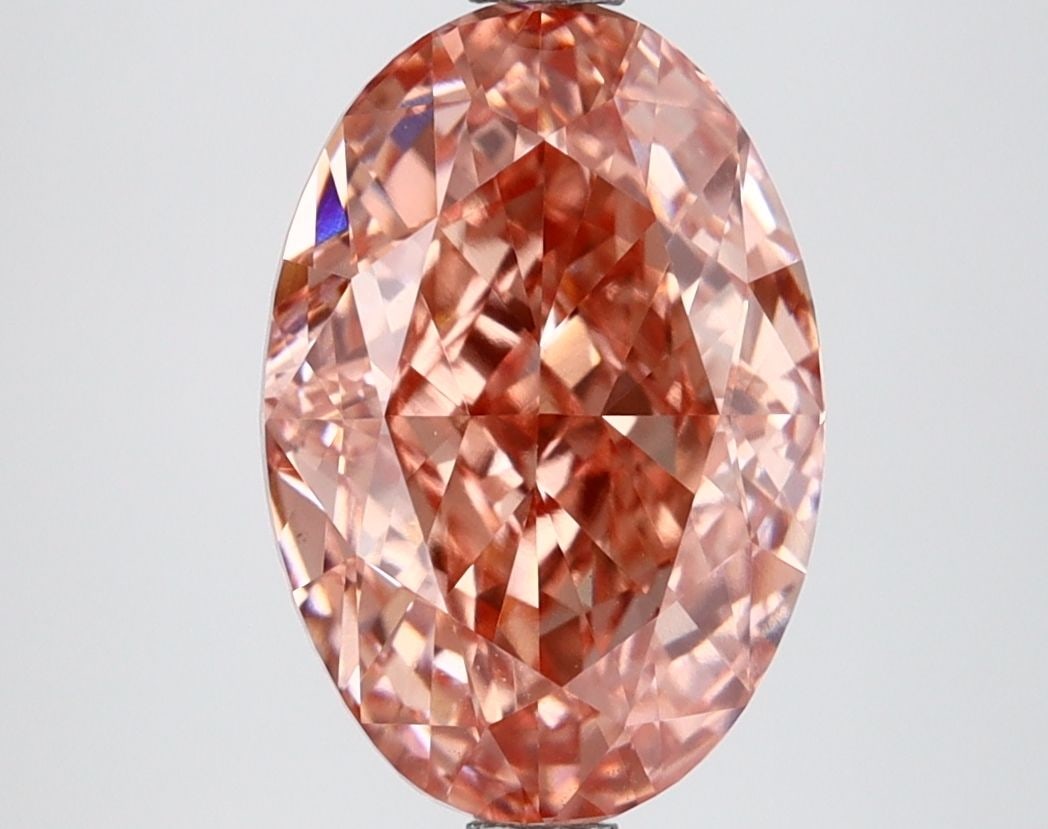 Loose Diamond - OVAL 3.53ct Fancy Vivid Pink VVS2: Loose Diamond - OVAL 3.53ct Fancy Vivid Pink VVS2 Source: This is a real non-mined Diamond that has been grown in a lab Shape: OVAL Carats: 3.53 Color: Fancy Vivid Pink Certification: IGI Video: