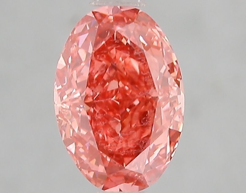 Loose Diamond - OVAL 1.6ct Fancy Vivid Pink VVS2: Loose Diamond - OVAL 1.6ct Fancy Vivid Pink VVS2 Source: This is a real non-mined Diamond that has been grown in a lab Shape: OVAL Carats: 1.6 Color: Fancy Vivid Pink Certification: IGI Video: