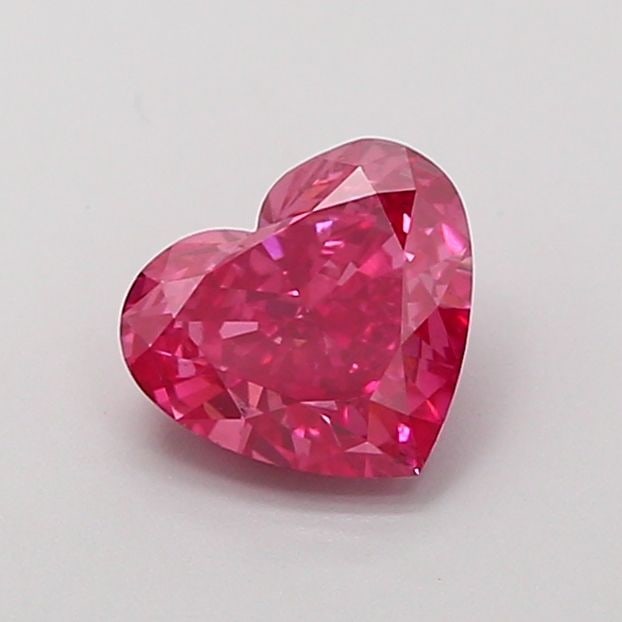 Loose Diamond - HEART 1.06ct Fancy Vivid Pink VS2: Loose Diamond - HEART 1.06ct Fancy Vivid Pink VS2 Source: This is a real non-mined Diamond that has been grown in a lab Shape: HEART Carats: 1.06 Color: Fancy Vivid Pink Certification: IGI Video: