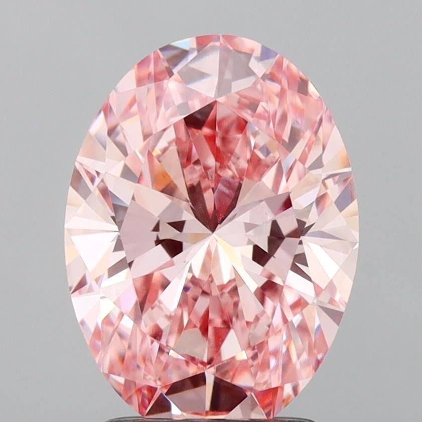 Loose Diamond - OVAL 2.1ct Fancy Vivid Pink VVS2: Loose Diamond - OVAL 2.1ct Fancy Vivid Pink VVS2 Source: This is a real non-mined Diamond that has been grown in a lab Shape: OVAL Carats: 2.1 Color: Fancy Vivid Pink Certification: IGI Video: