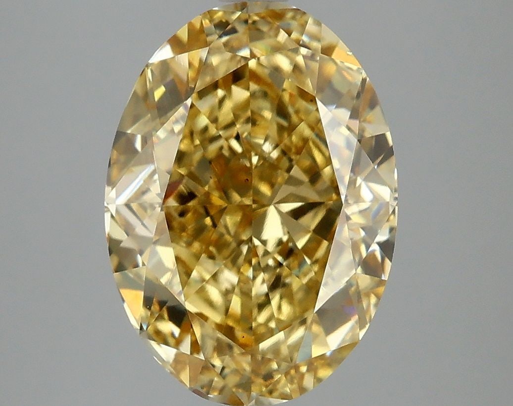 Loose Diamond - OVAL 5.08ct Fancy Vivid Yellow VS1: Loose Diamond - OVAL 5.08ct Fancy Vivid Yellow VS1 Source: This is a real non-mined Diamond that has been grown in a lab Shape: OVAL Carats: 5.08 Color: Fancy Vivid Yellow Certification: IGI Video:
