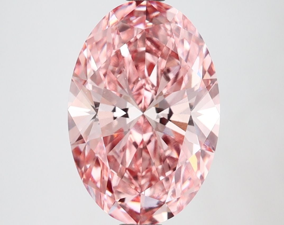Loose Diamond - OVAL 2.7ct Fancy Vivid Pink VVS2: Loose Diamond - OVAL 2.7ct Fancy Vivid Pink VVS2 Source: This is a real non-mined Diamond that has been grown in a lab Shape: OVAL Carats: 2.7 Color: Fancy Vivid Pink Certification: IGI Video: