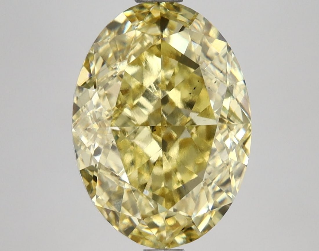 Loose Diamond - OVAL 4.68ct Fancy Vivid Yellow VS2: Loose Diamond - OVAL 4.68ct Fancy Vivid Yellow VS2 Source: This is a real non-mined Diamond that has been grown in a lab Shape: OVAL Carats: 4.68 Color: Fancy Vivid Yellow Certification: IGI Video: