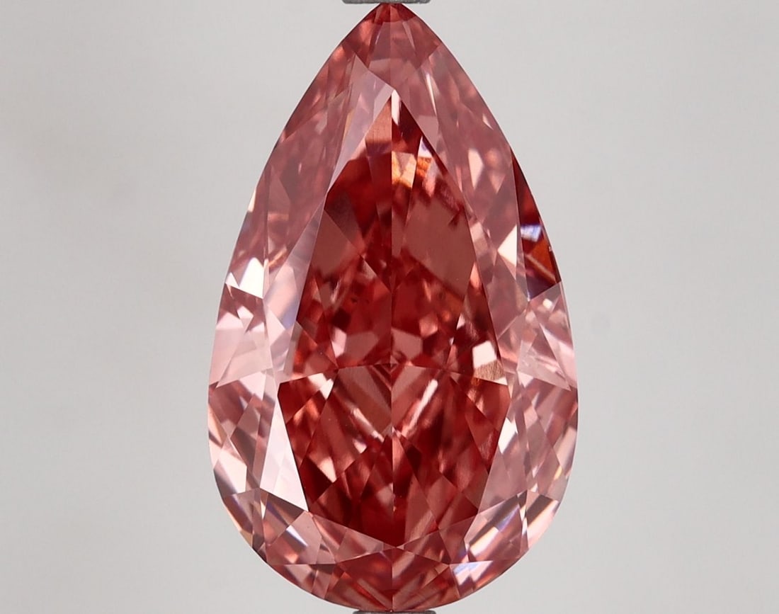 Loose Diamond - PEAR 5.19ct Fancy Vivid Brownish Pink VS1: Loose Diamond - PEAR 5.19ct Fancy Vivid Brownish Pink VS1 Source: This is a real non-mined Diamond that has been grown in a lab Shape: PEAR Carats: 5.19 Color: Fancy Vivid Brownish Pink Certification: