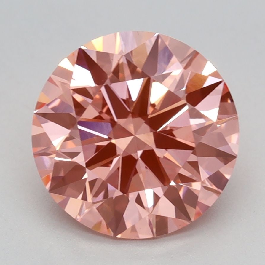 Ideal Loose Diamond - ROUND 2.1ct Fancy Vivid Pink VS1: Ideal Loose Diamond - ROUND 2.1ct Fancy Vivid Pink VS1 Source: This is a real non-mined Diamond that has been grown in a lab Shape: ROUND Carats: 2.1 Color: Fancy Vivid Pink Certification: IGI Video: