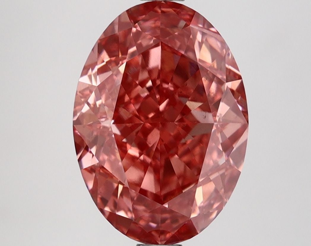 Loose Diamond - OVAL 3.83ct Fancy Vivid Pink VS2: Loose Diamond - OVAL 3.83ct Fancy Vivid Pink VS2 Source: This is a real non-mined Diamond that has been grown in a lab Shape: OVAL Carats: 3.83 Color: Fancy Vivid Pink Certification: IGI Video:
