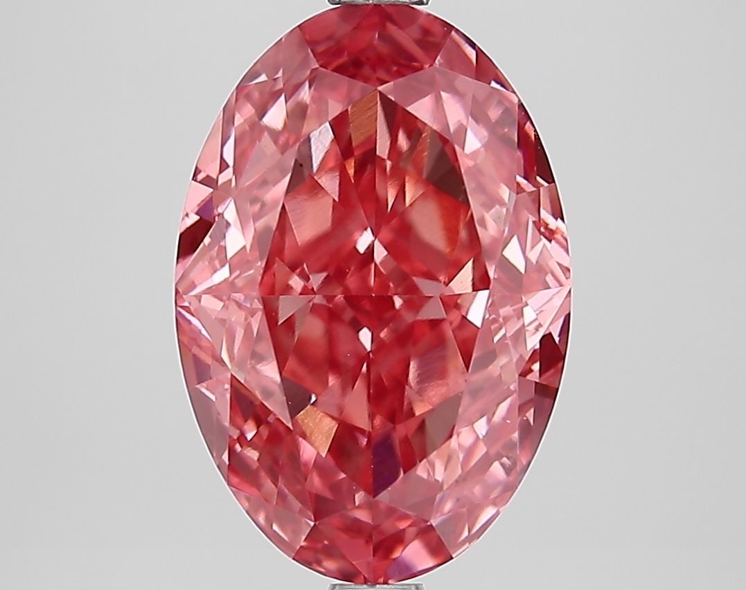 Loose Diamond - OVAL 4.08ct Fancy Vivid Pink VS1: Loose Diamond - OVAL 4.08ct Fancy Vivid Pink VS1 Source: This is a real non-mined Diamond that has been grown in a lab Shape: OVAL Carats: 4.08 Color: Fancy Vivid Pink Certification: IGI Video: