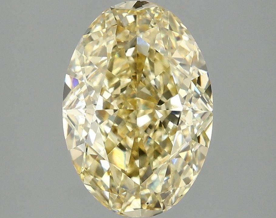 Loose Diamond - OVAL 3.08ct Fancy Intense Yellow VS2: Loose Diamond - OVAL 3.08ct Fancy Intense Yellow VS2 Source: This is a real non-mined Diamond that has been grown in a lab Shape: OVAL Carats: 3.08 Color: Fancy Intense Yellow Certification: IGI Video