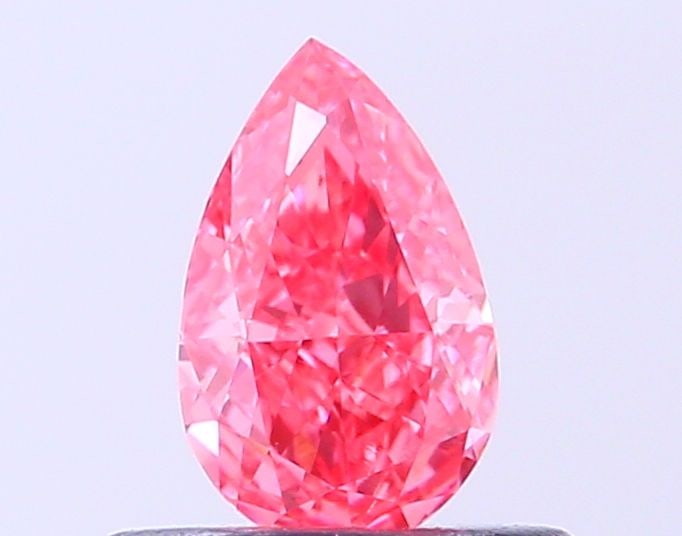 Loose Diamond - PEAR 0.36ct Fancy Vivid Pink VS2: Loose Diamond - PEAR 0.36ct Fancy Vivid Pink VS2 Source: This is a real non-mined Diamond that has been grown in a lab Shape: PEAR Carats: 0.36 Color: Fancy Vivid Pink Certification: IGI Video: