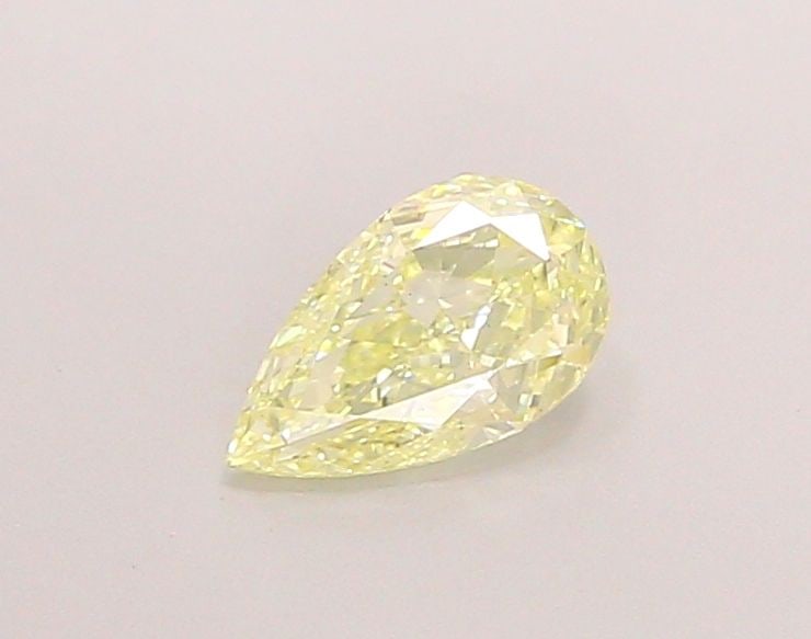 Loose Diamond - PEAR 0.81ct Fancy Light Yellow VS2: Loose Diamond - PEAR 0.81ct Fancy Light Yellow VS2 Source: This is a real non-mined Diamond that has been grown in a lab Shape: PEAR Carats: 0.81 Color: Fancy Light Yellow Certification: IGI Video: