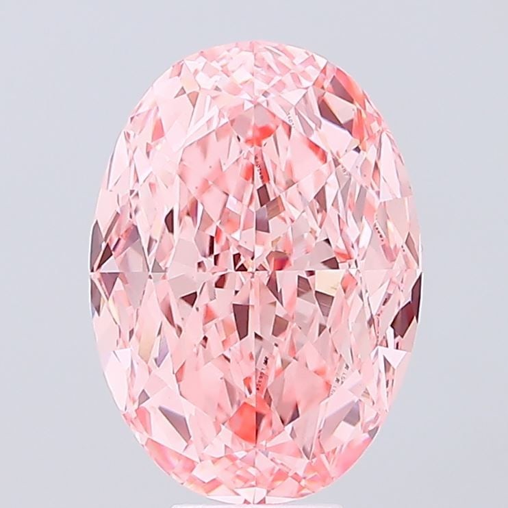 Loose Diamond - OVAL 10.32ct Fancy Vivid Pink VS1: Loose Diamond - OVAL 10.32ct Fancy Vivid Pink VS1 Source: This is a real non-mined Diamond that has been grown in a lab Shape: OVAL Carats: 10.32 Color: Fancy Vivid Pink Certification: IGI Video: