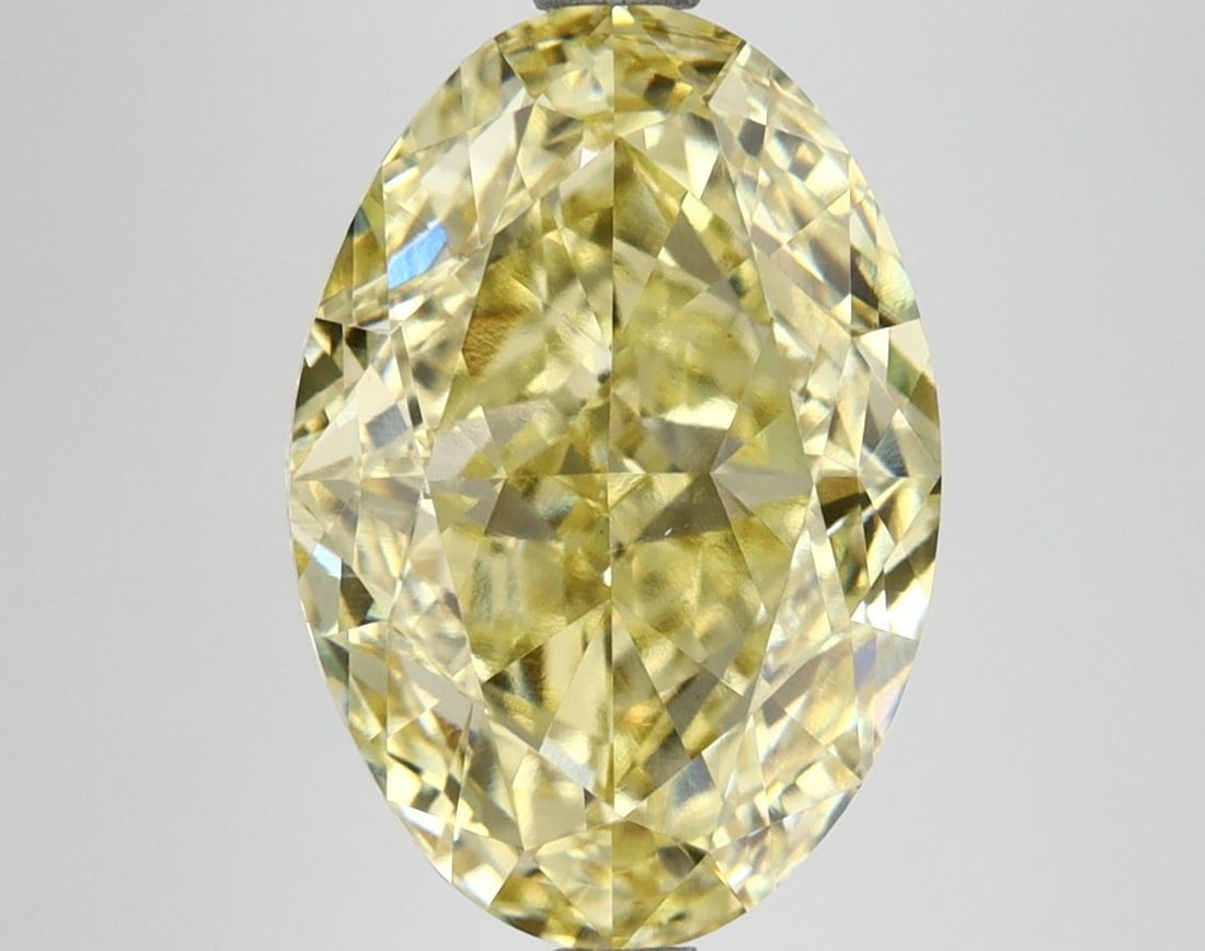 Loose Diamond - OVAL 5.55ct Fancy Vivid Yellow VS1: Loose Diamond - OVAL 5.55ct Fancy Vivid Yellow VS1 Source: This is a real non-mined Diamond that has been grown in a lab Shape: OVAL Carats: 5.55 Color: Fancy Vivid Yellow Certification: IGI Video: