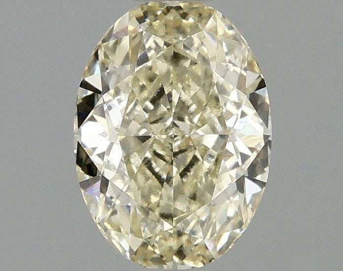 Loose Diamond - OVAL 1.1ct Fancy Yellow VS1: Loose Diamond - OVAL 1.1ct Fancy Yellow VS1 Source: This is a real non-mined Diamond that has been grown in a lab Shape: OVAL Carats: 1.1 Color: Fancy Yellow Certification: IGI Video: