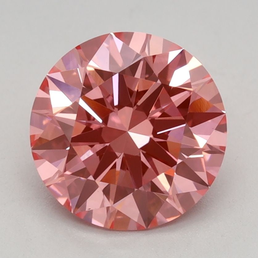 Ideal Loose Diamond - ROUND 1.58ct Fancy Vivid Pink VS1: Ideal Loose Diamond - ROUND 1.58ct Fancy Vivid Pink VS1 Source: This is a real non-mined Diamond that has been grown in a lab Shape: ROUND Carats: 1.58 Color: Fancy Vivid Pink Certification: IGI Video