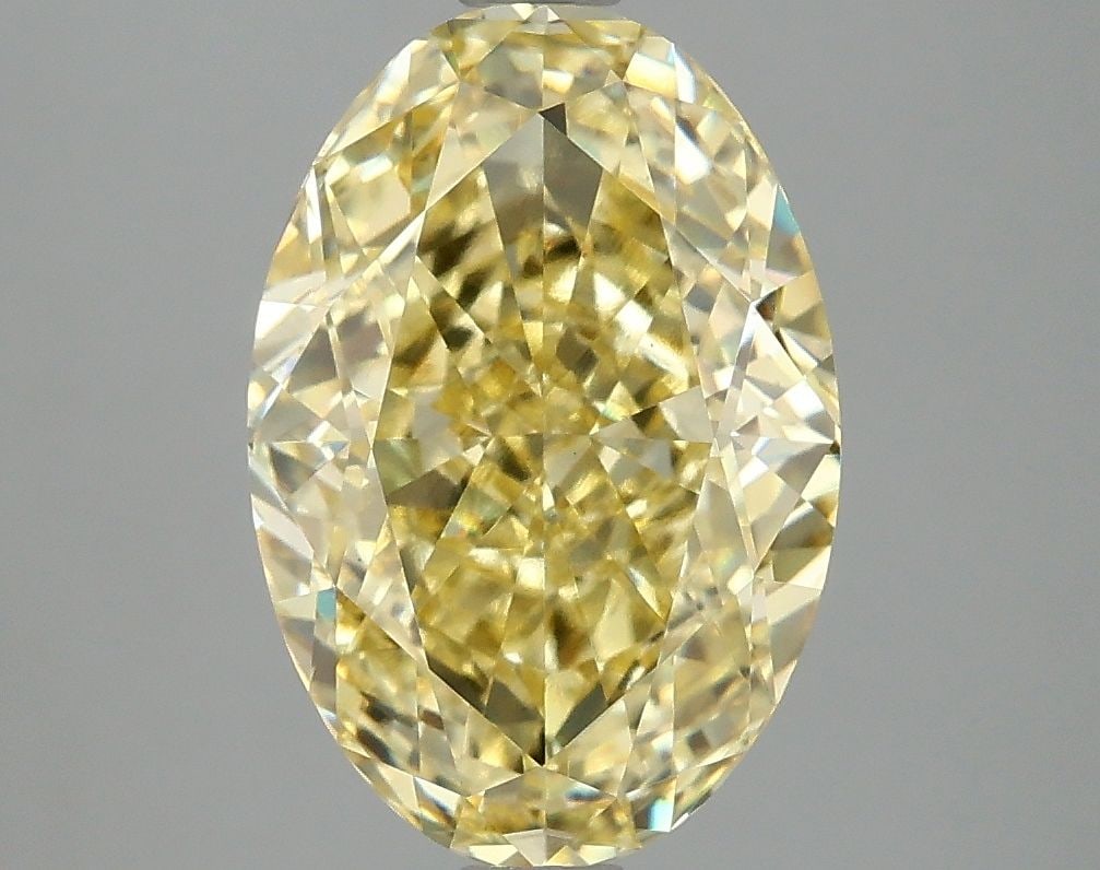 Loose Diamond - OVAL 4.1ct Fancy Intense Yellow VS1: Loose Diamond - OVAL 4.1ct Fancy Intense Yellow VS1 Source: This is a real non-mined Diamond that has been grown in a lab Shape: OVAL Carats: 4.1 Color: Fancy Intense Yellow Certification: IGI Video: