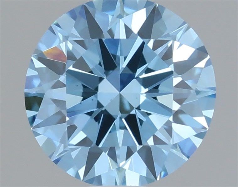 Ideal Loose Diamond - ROUND 0.63ct Fancy Vivid Blue VS1: Ideal Loose Diamond - ROUND 0.63ct Fancy Vivid Blue VS1 Source: This is a real non-mined Diamond that has been grown in a lab Shape: ROUND Carats: 0.63 Color: Fancy Vivid Blue Certification: IGI